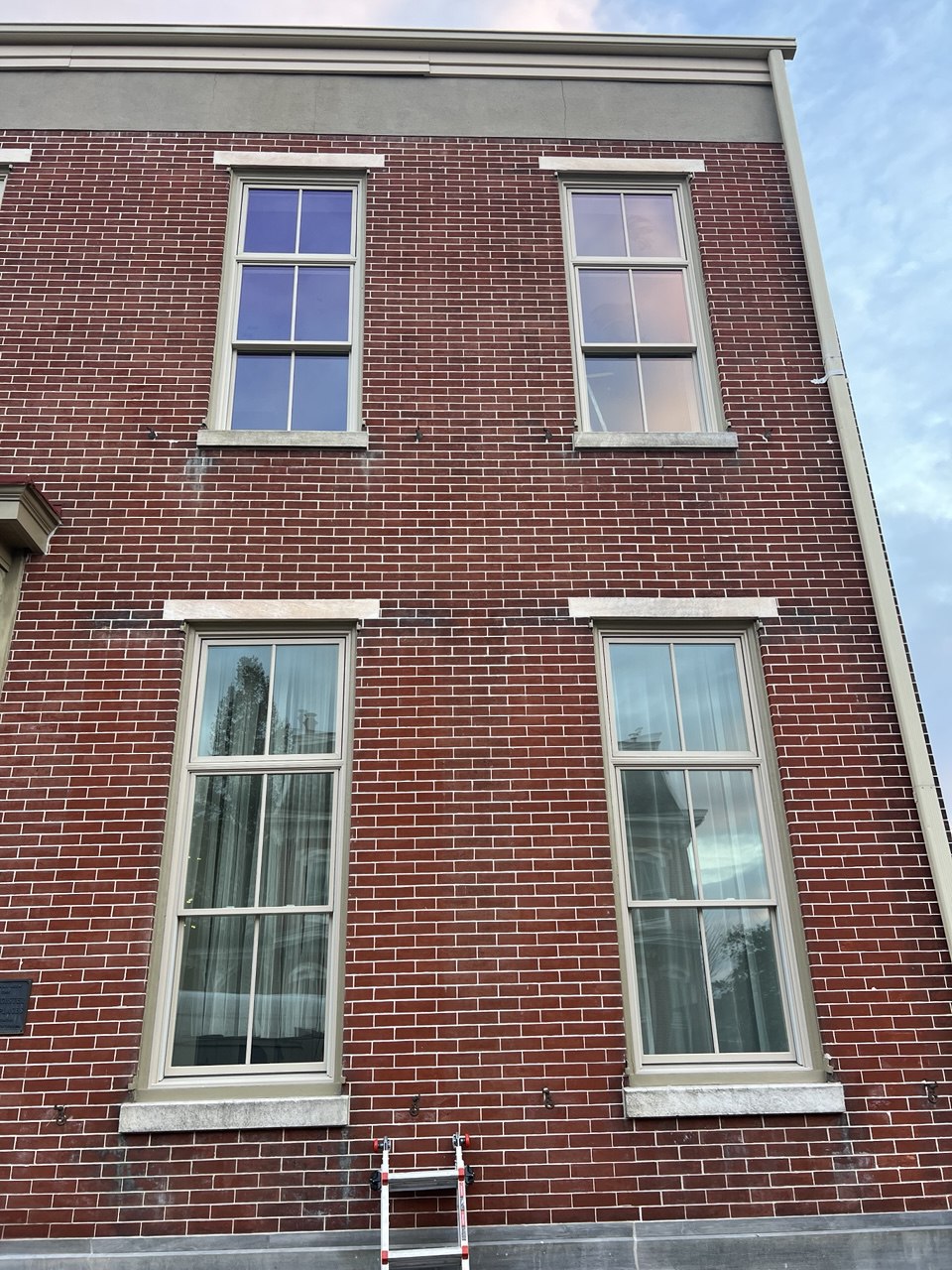 Multi-story windows on brick building